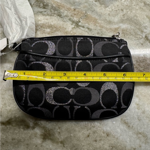 NWT!! Coach wristlet, still in packaging!! Black, silver, and grey. Smoke free - Picture 9 of 9